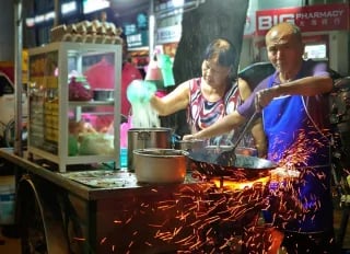 Perak Road Night Char Koay Teow — the sifu firing the wok over charcoal