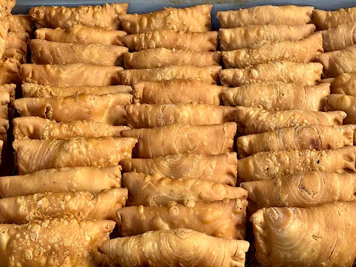 Adam's Curry Puff is Generously Sized — signature dish