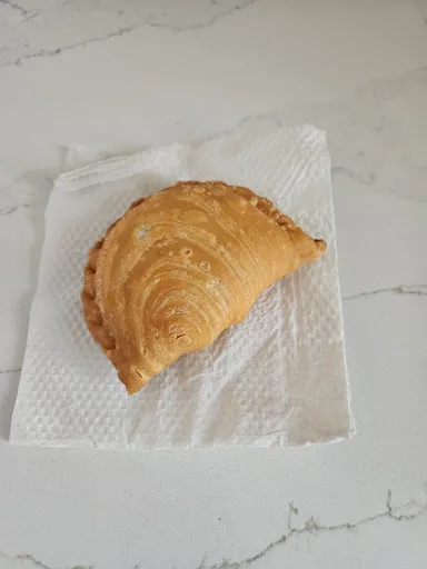 Adam's Curry Puff is Generously Sized — signature dish