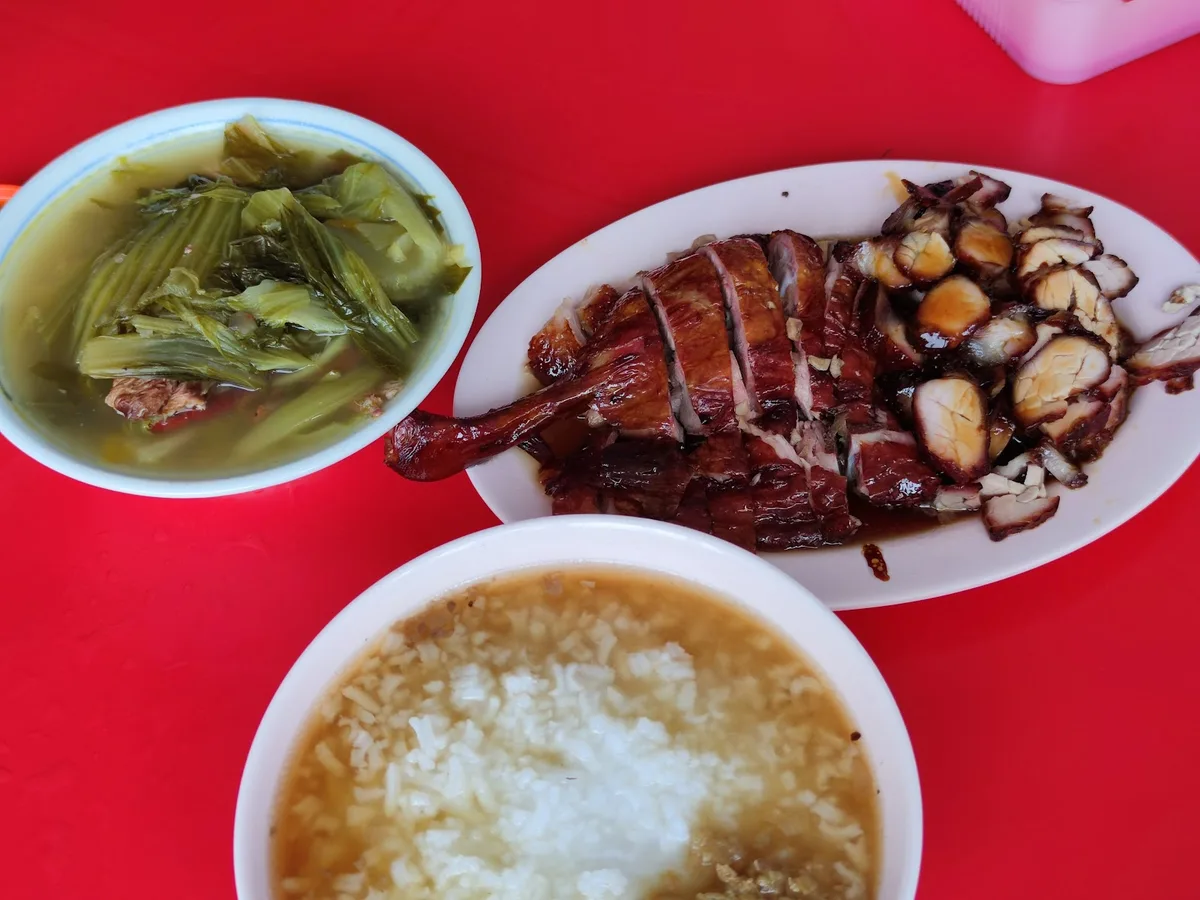 Ah Moi Kau Roast Duck Porridge Rice — signature dish