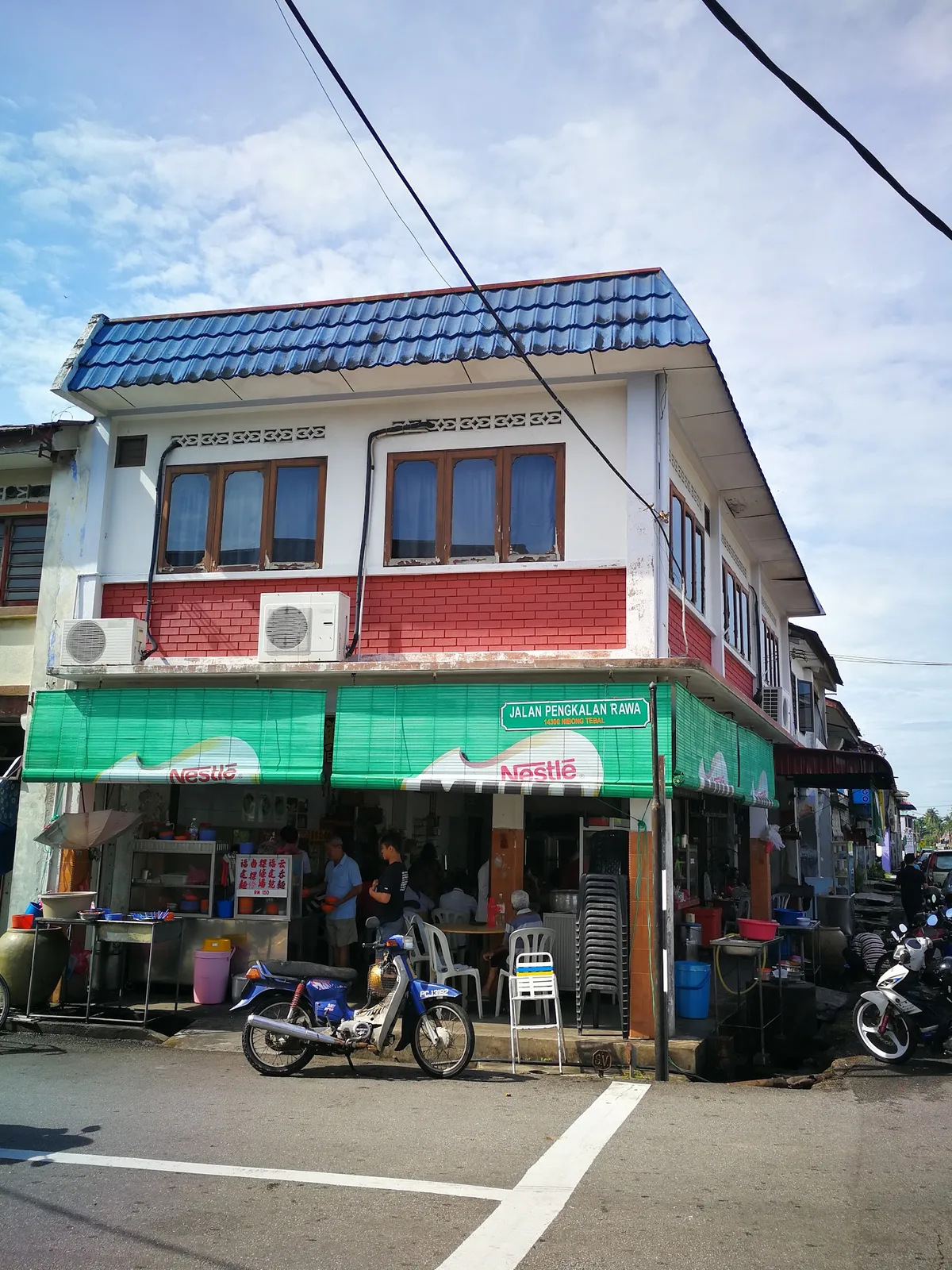 The kopitiam's two-storey corner shophouse