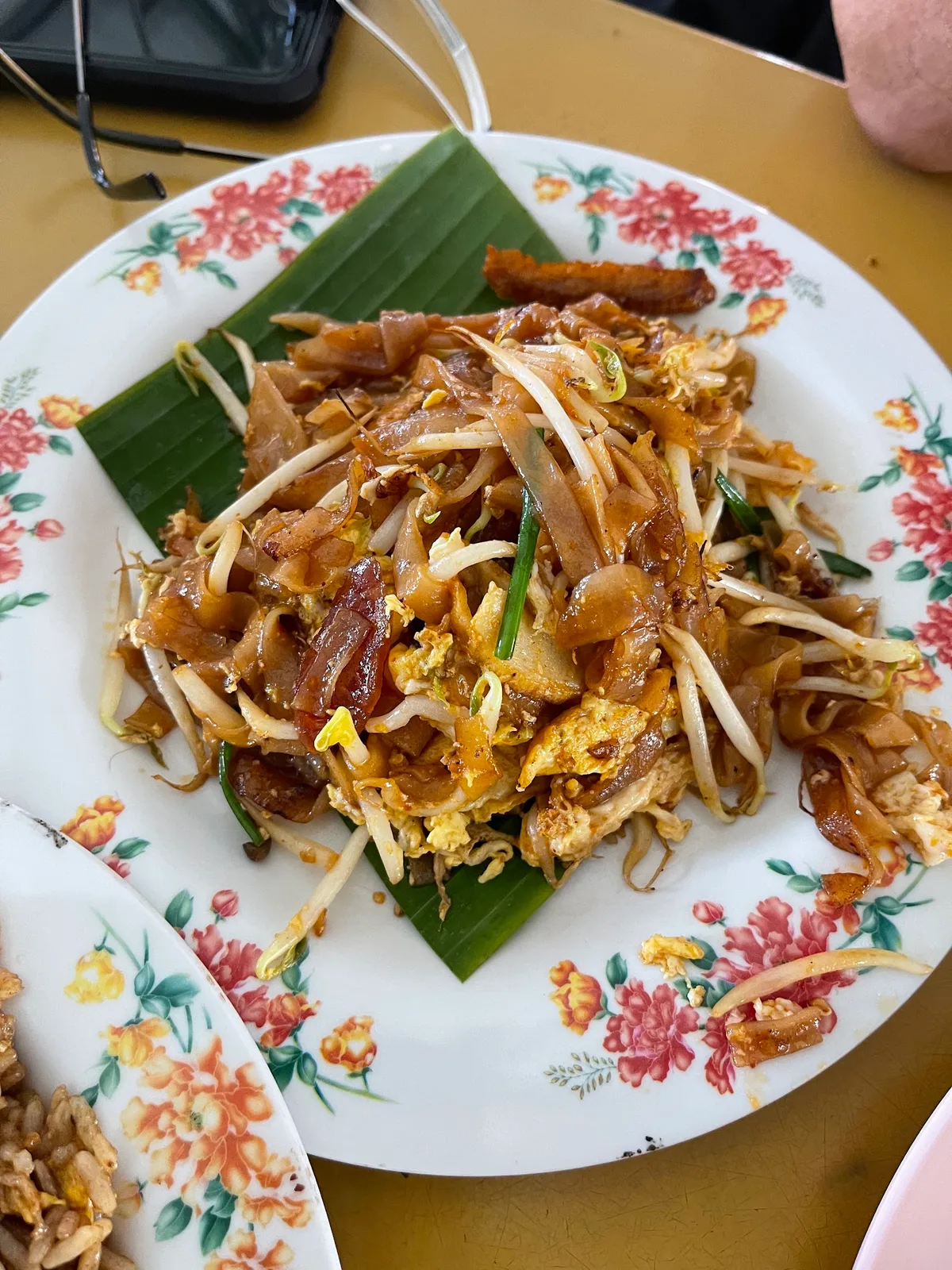 Wok-charred char koay teow with egg and sprouts