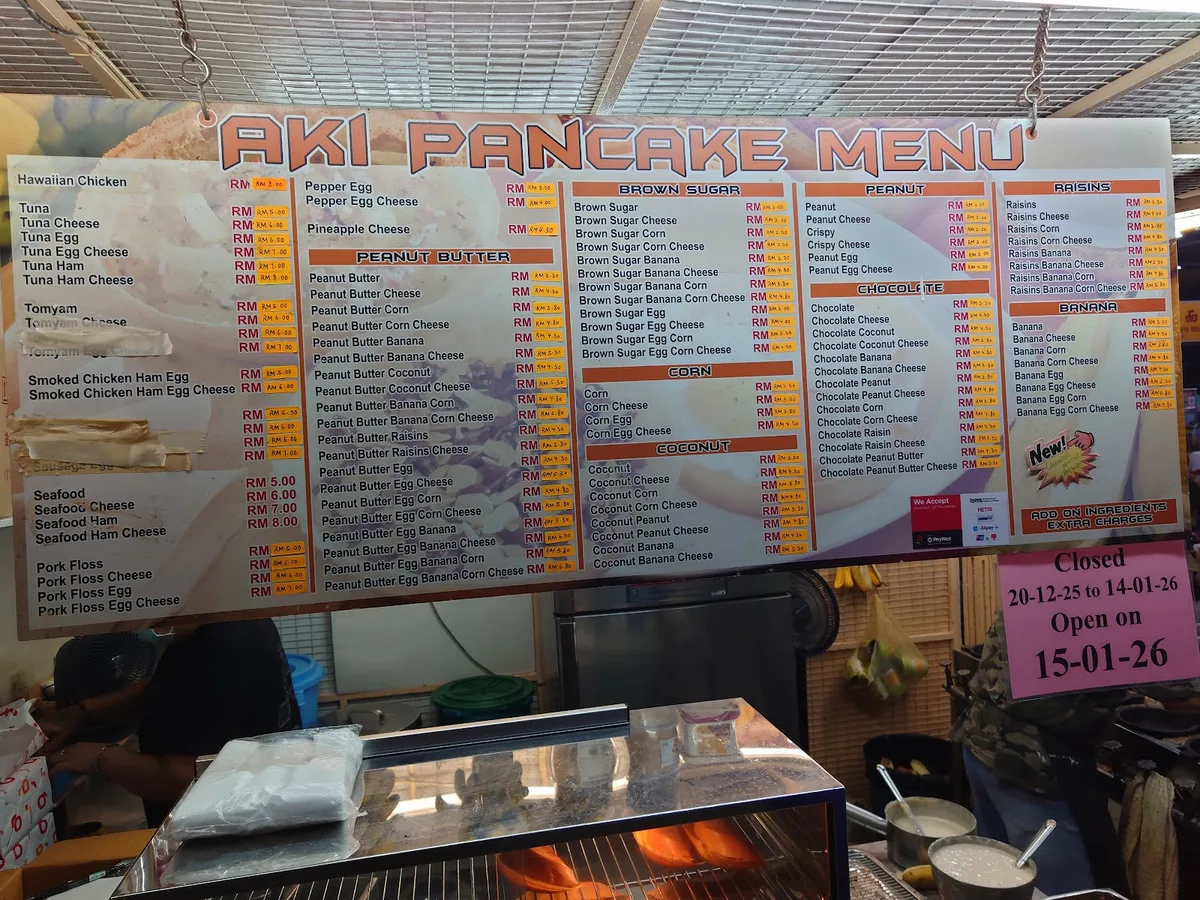 The Aki Pancake menu board listing the pancake fillings