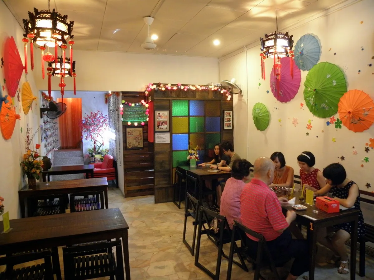 All About Sugar & Gift — interior with paper-umbrella wall