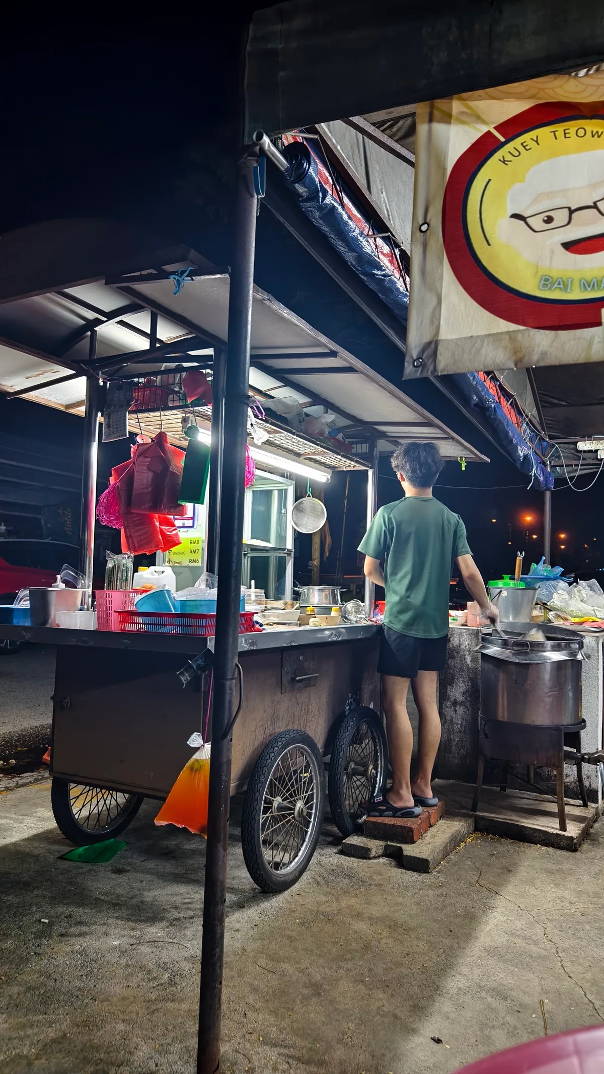 Night stall with the Kuey Teow banner