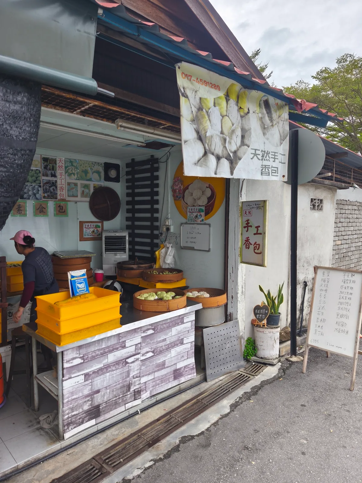 The little pao shop front with its steamers and handwritten menu