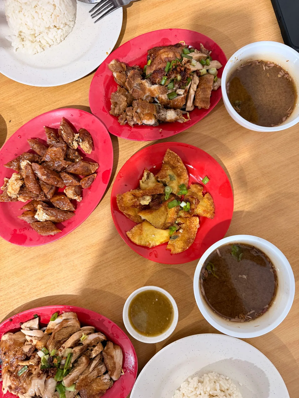 Chicken rice spread with roast chicken, salted pork and asam soup