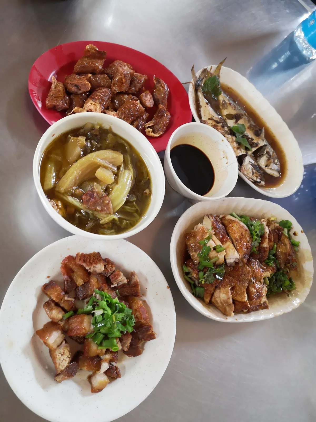 Pork, mustard green soup and sides