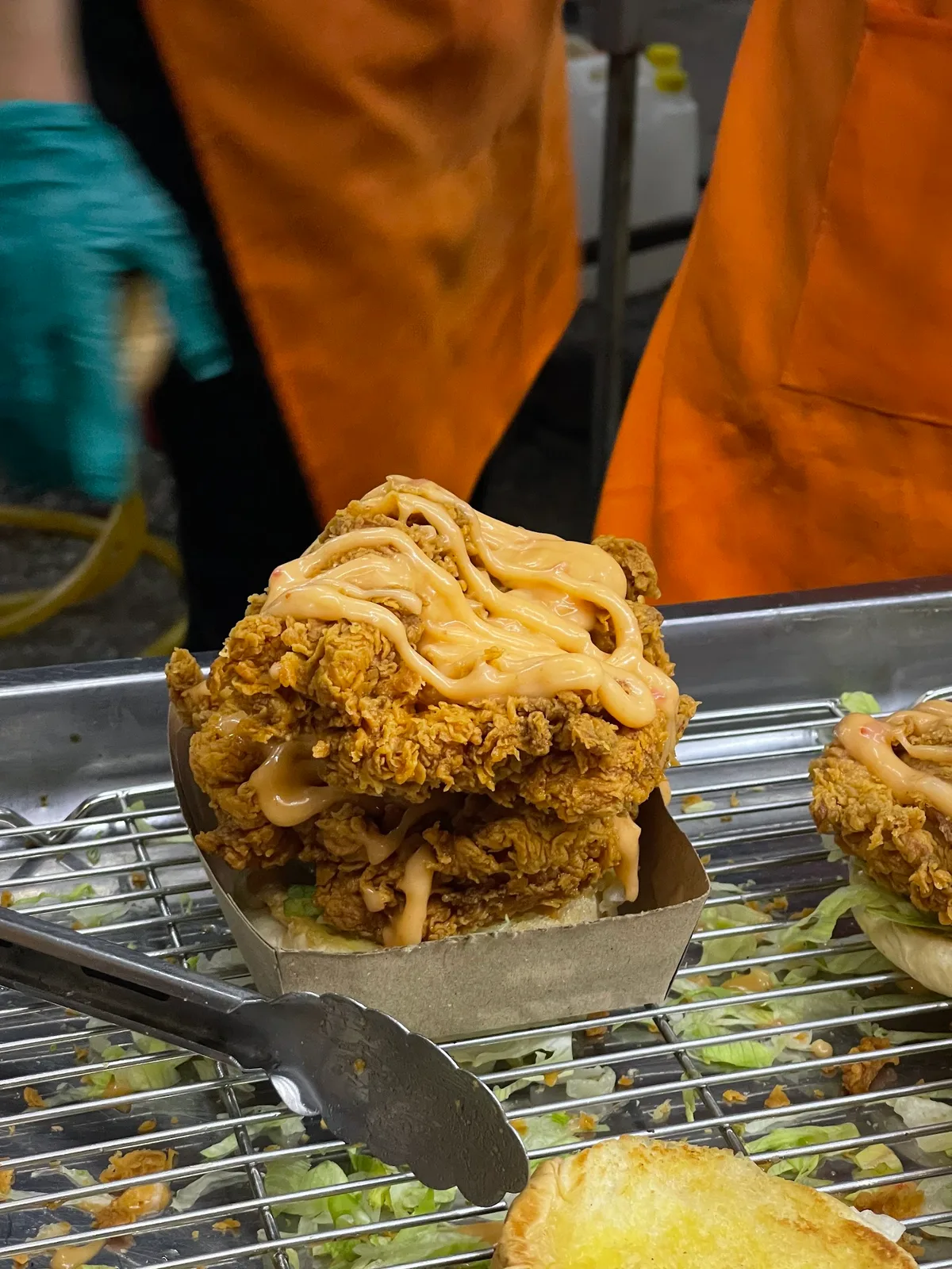 Chicken coming out of the fryer