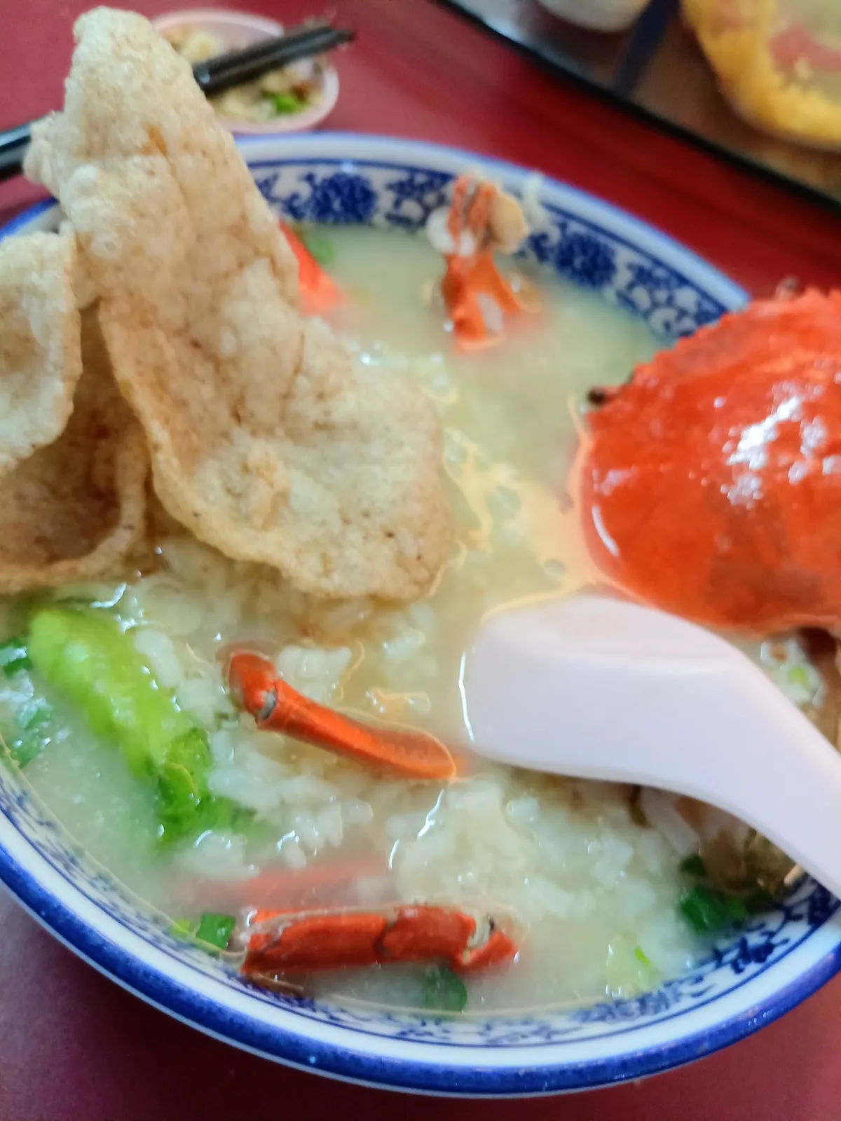 Crab porridge with prawn crackers