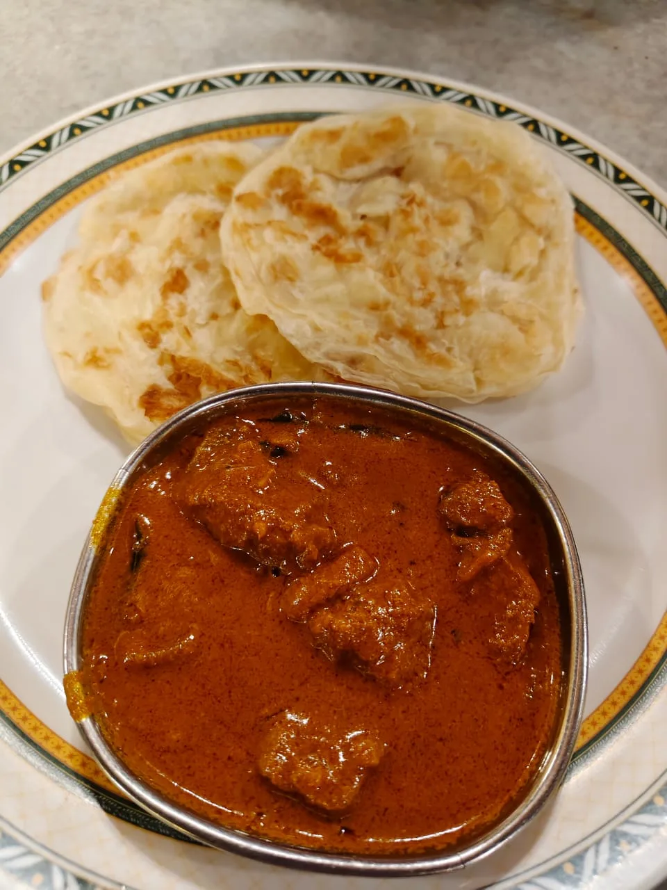 Parotta with mutton curry