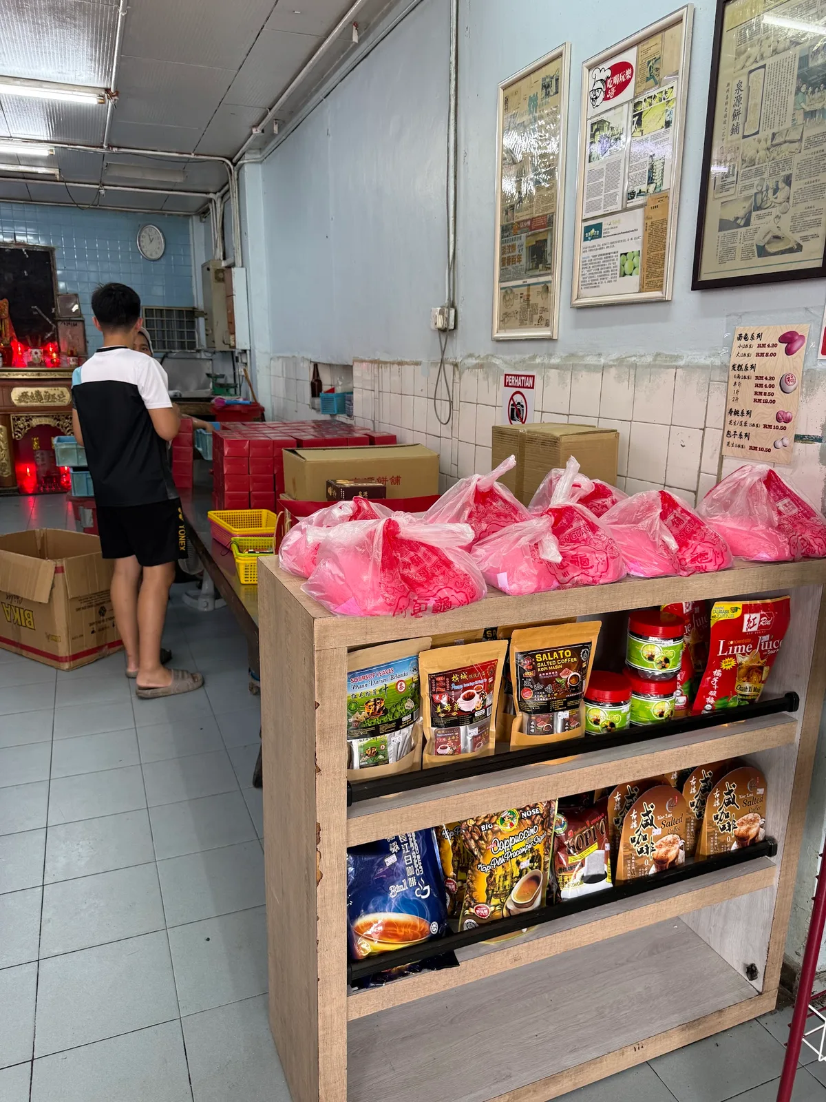 Inside the biscuit shop, shelves of traditional snacks
