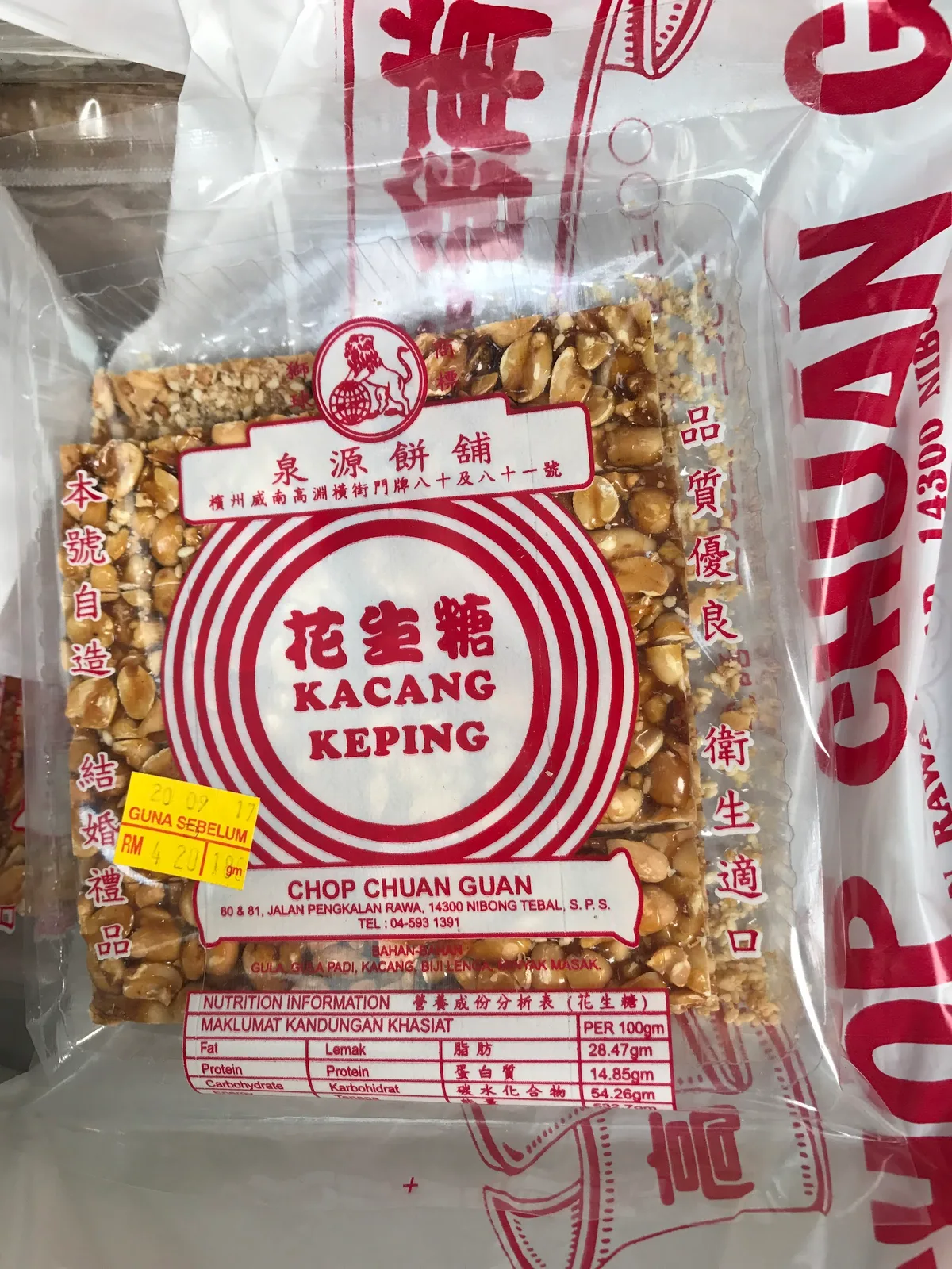Kacang keping peanut brittle in the shop's pack