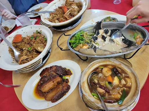 Crab Claypot Rice • Jia Hian Restaurant — signature dish