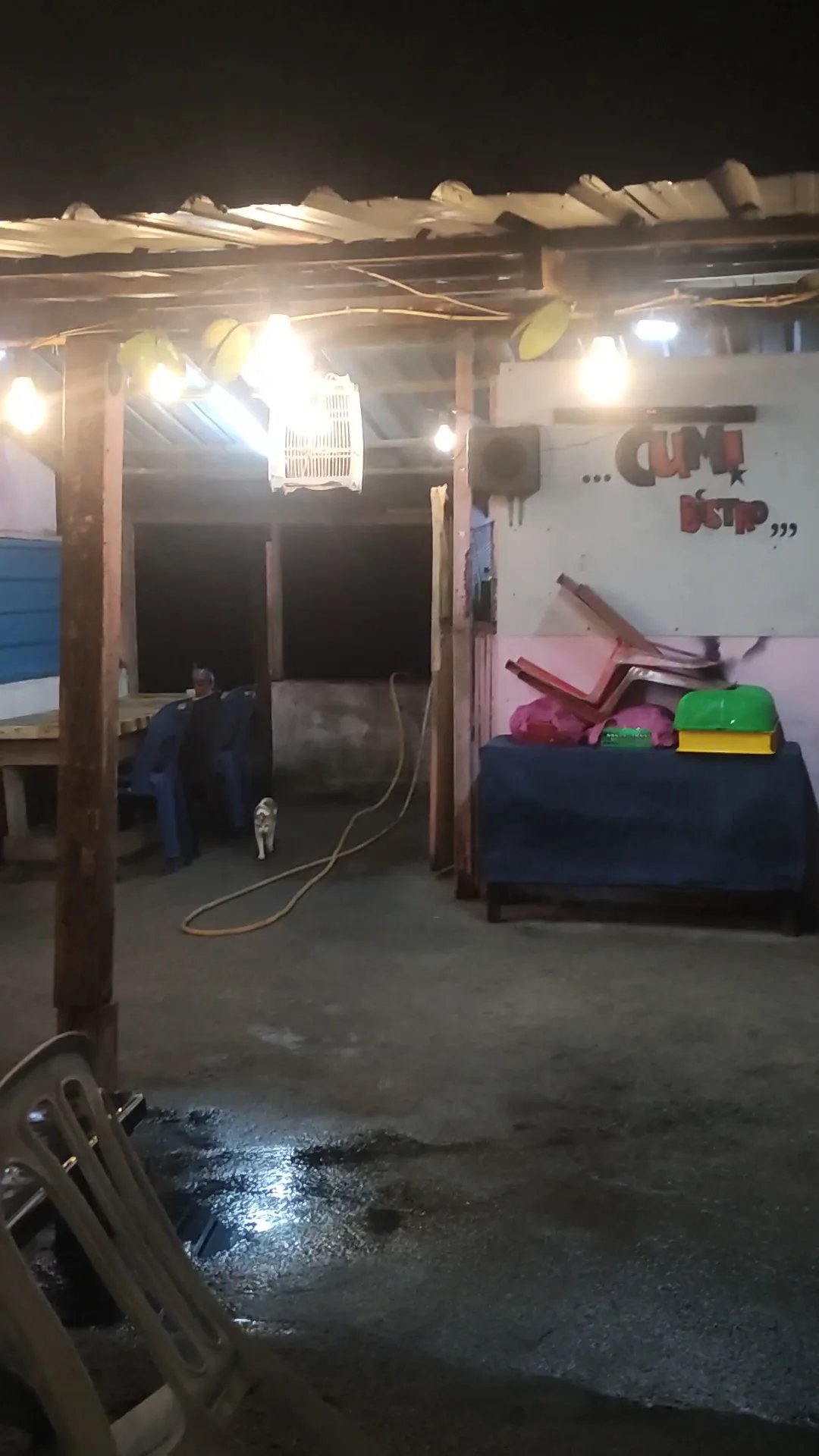 Cumi Bistro shed at night