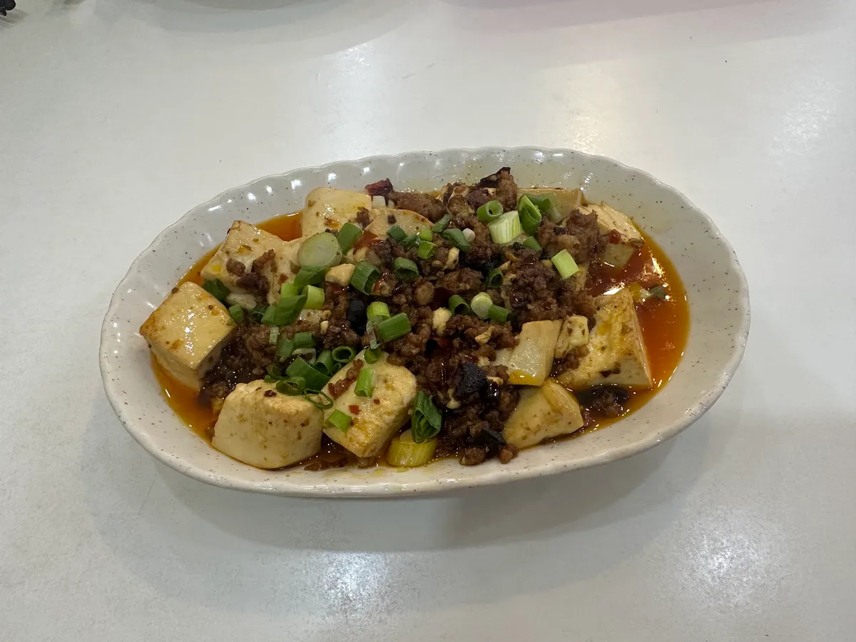 Tofu topped with minced meat, spring onion and chilli