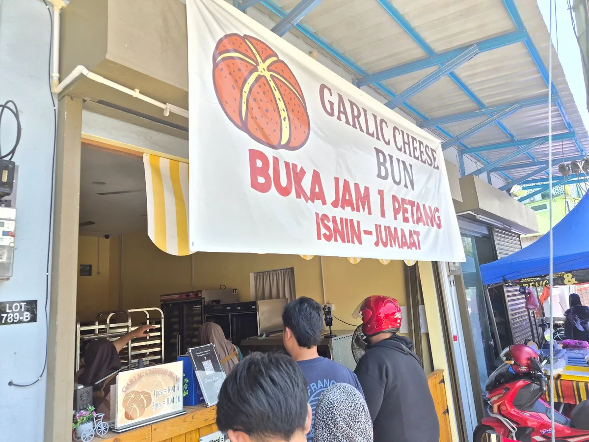 The Garlic Cheese Bun stall banner
