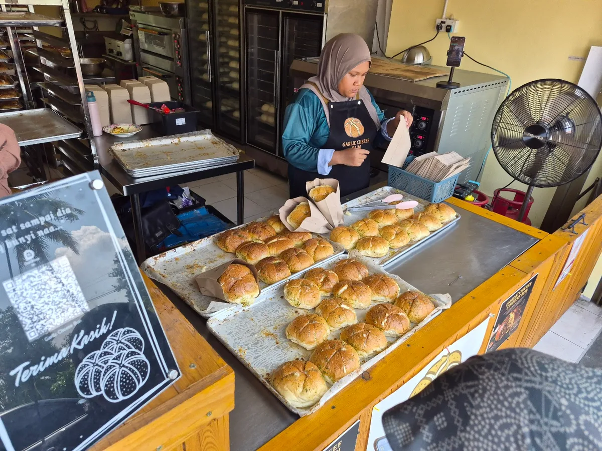 Trays of buns on the counter