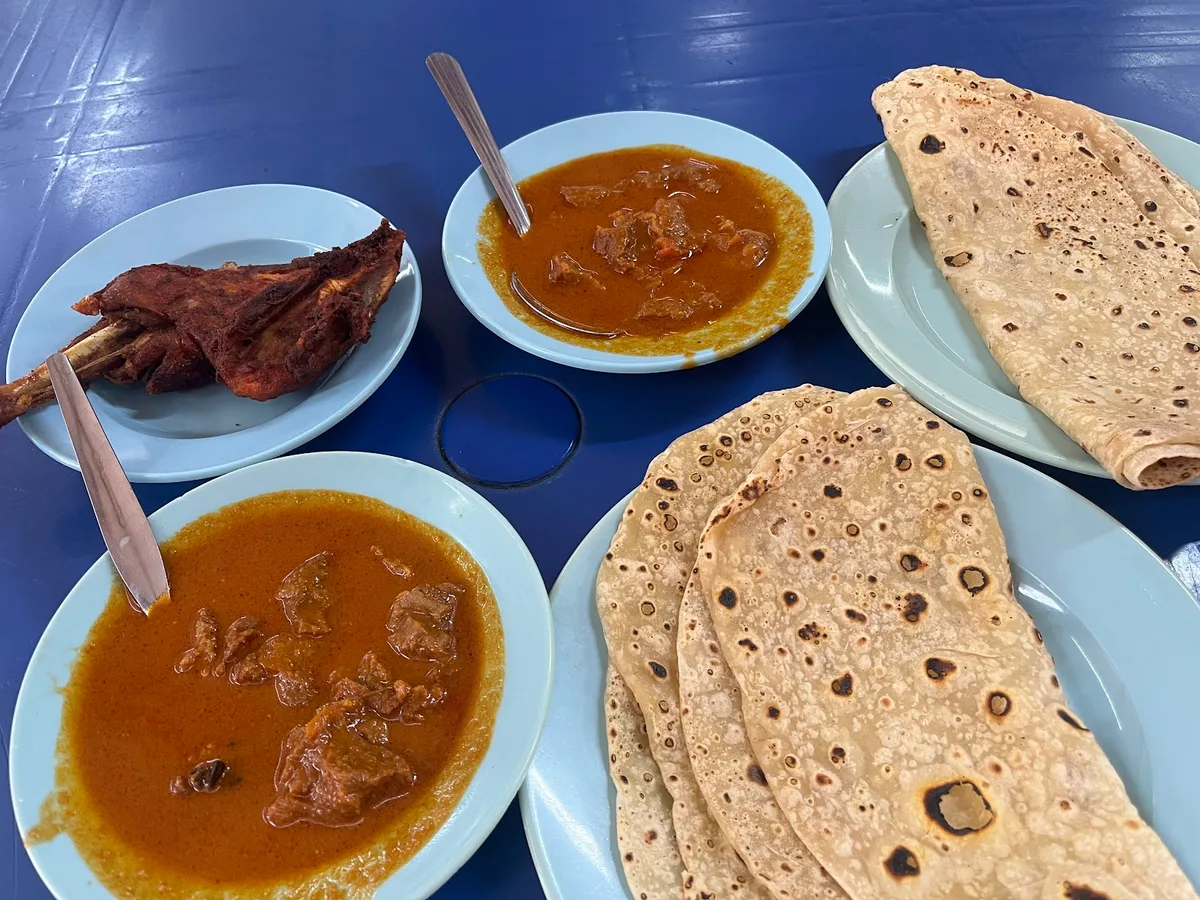 Chapati stack with mutton curry