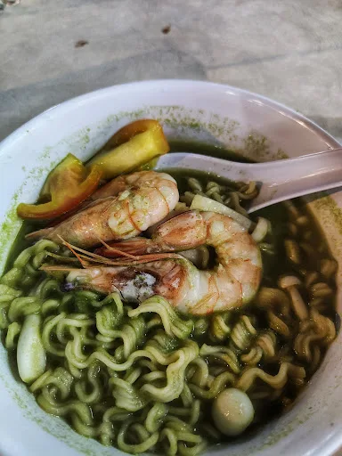 Ghee Lian Green Tomyam — signature dish