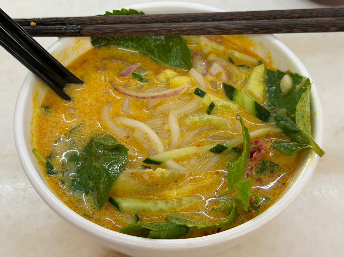 Lemak laksa with noodles and cucumber