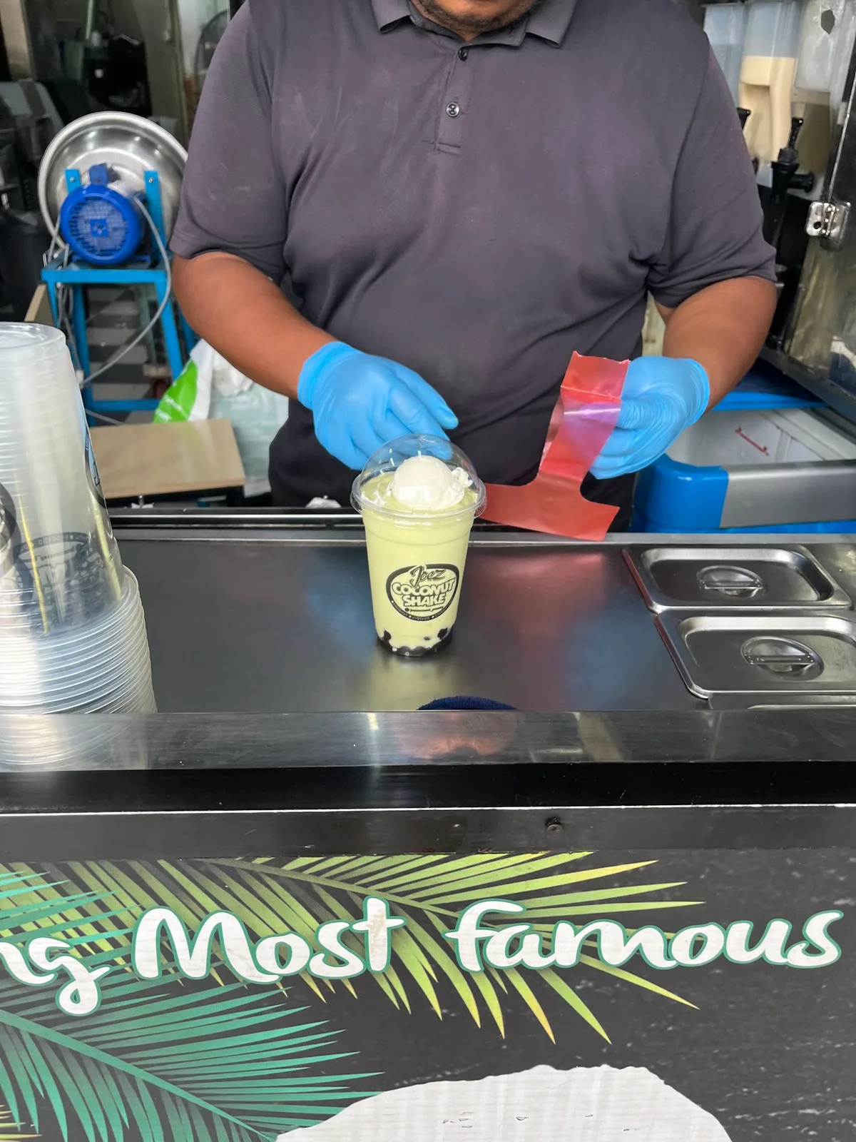 Coconut shake topped with ice cream at the counter