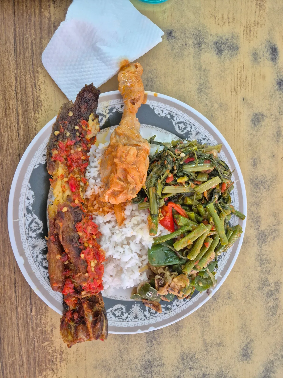 Sambal fish with fried chicken and greens