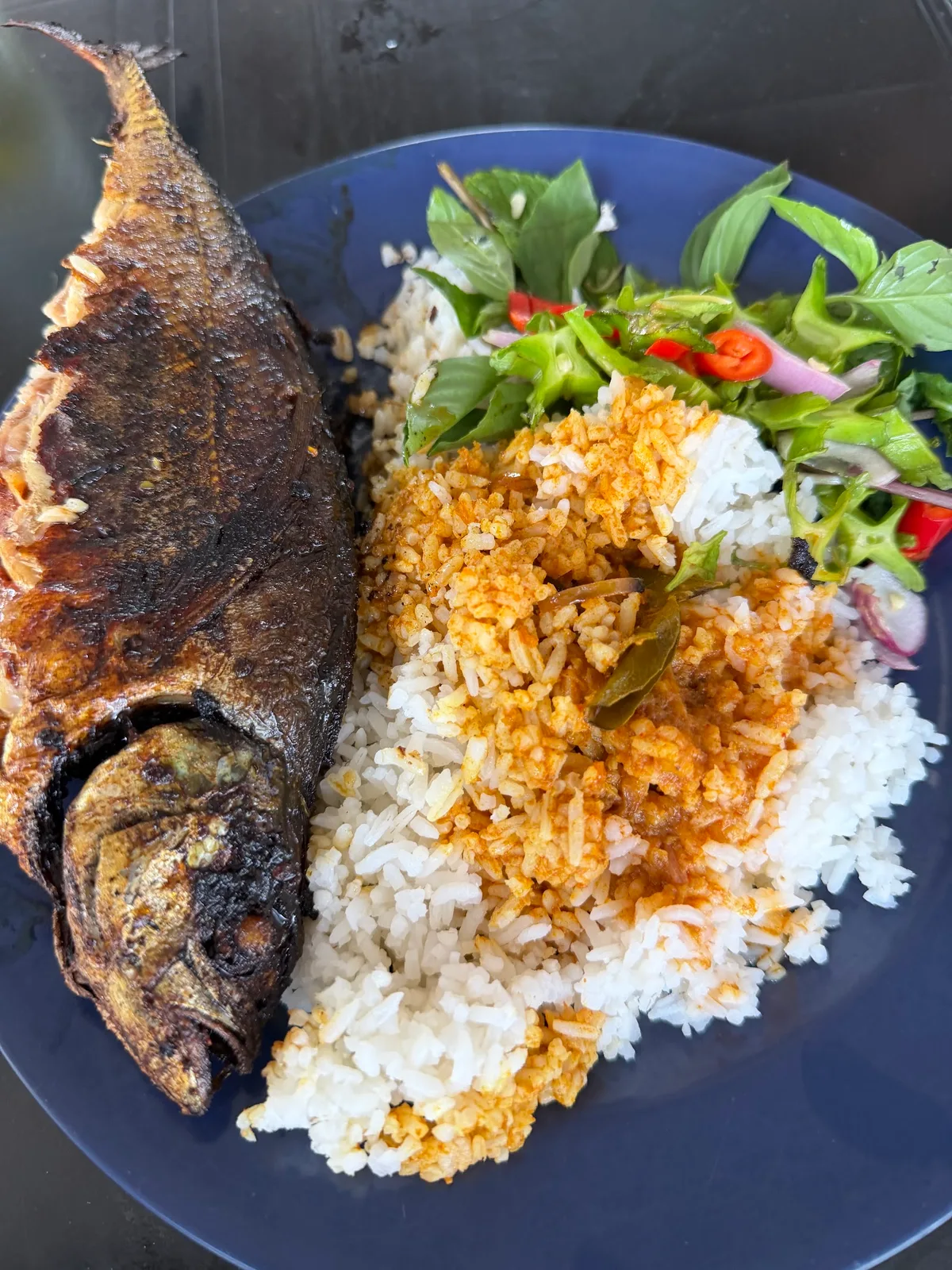 Fried fish with rice and sambal