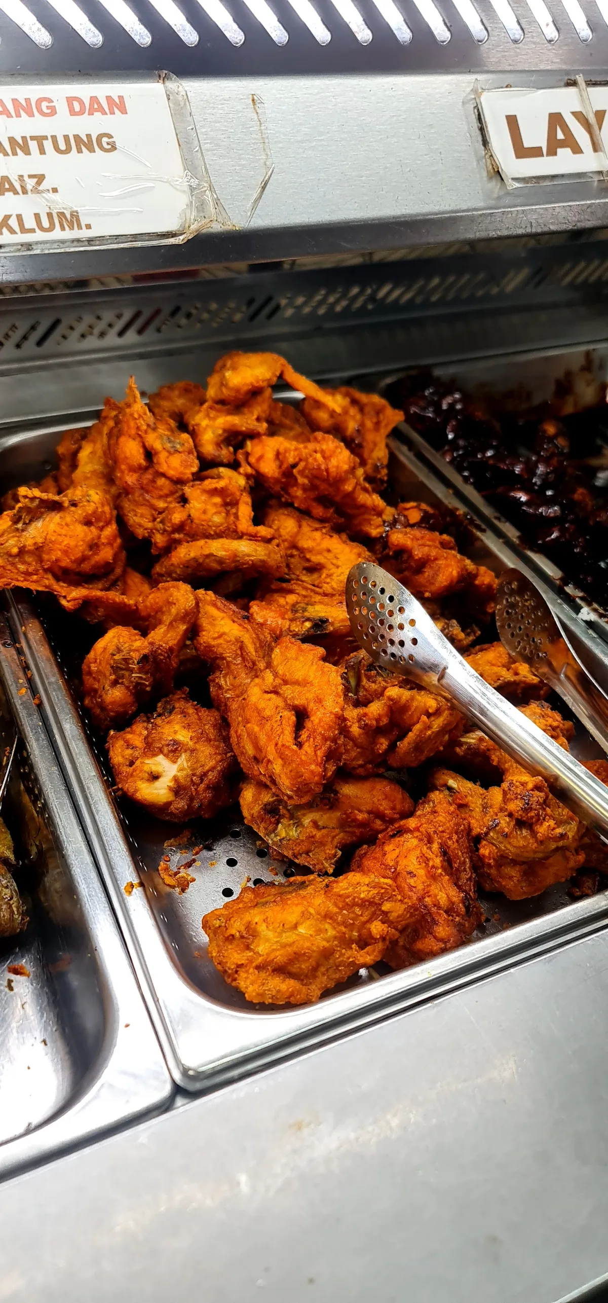 Tray of fried chicken on the counter