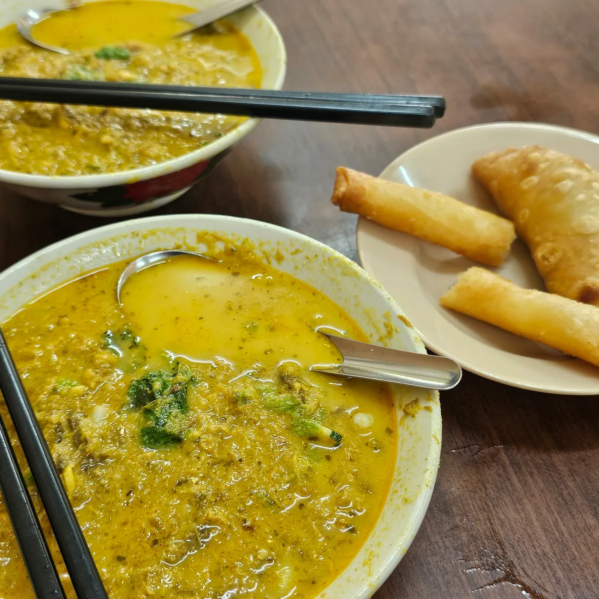 Lemak laksa with spring rolls