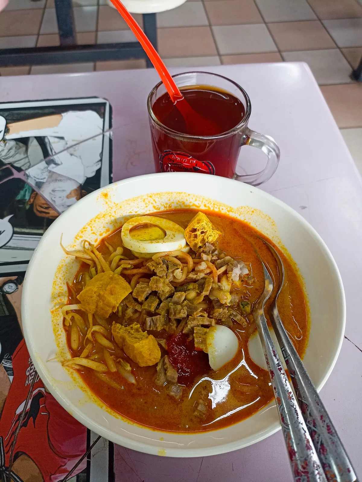 Mee kari with tofu puff and egg, sirap on the side