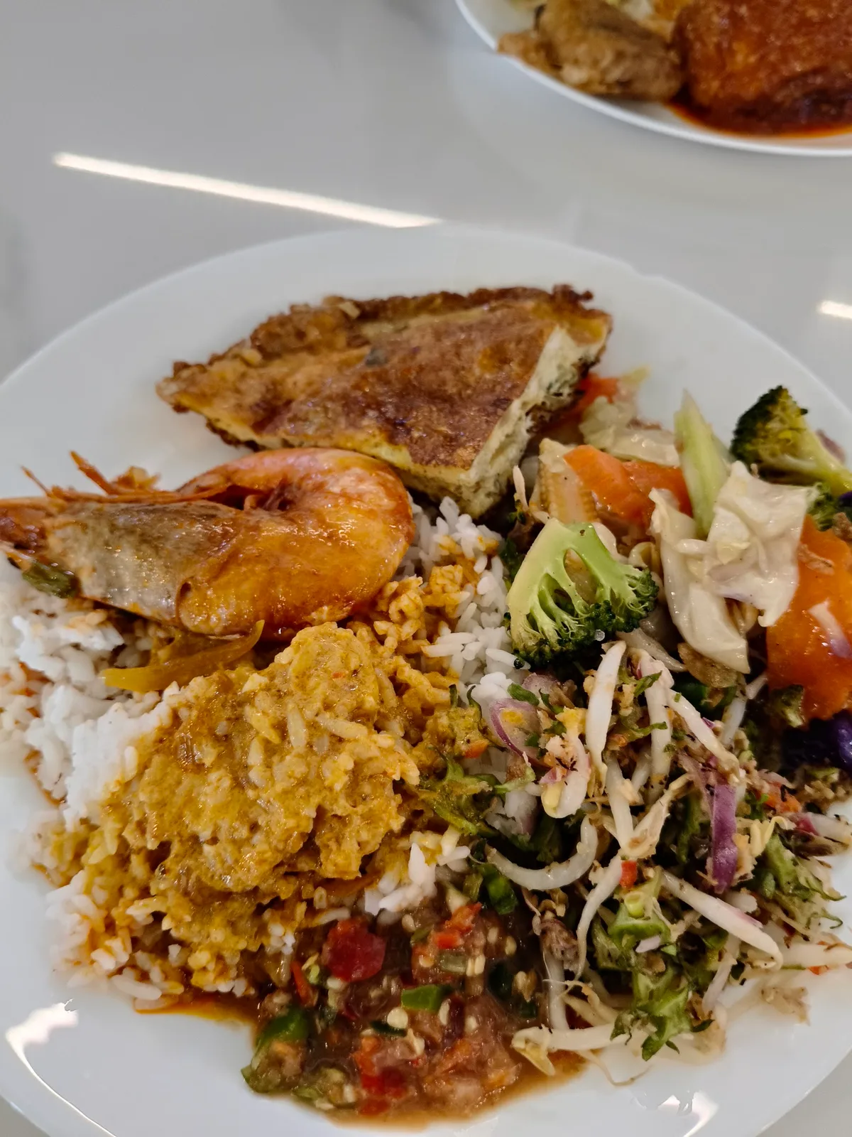 Nasi campur with prawn, egg and kerabu