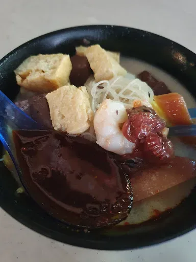 Mt Erskine Night Curry Mee — signature dish