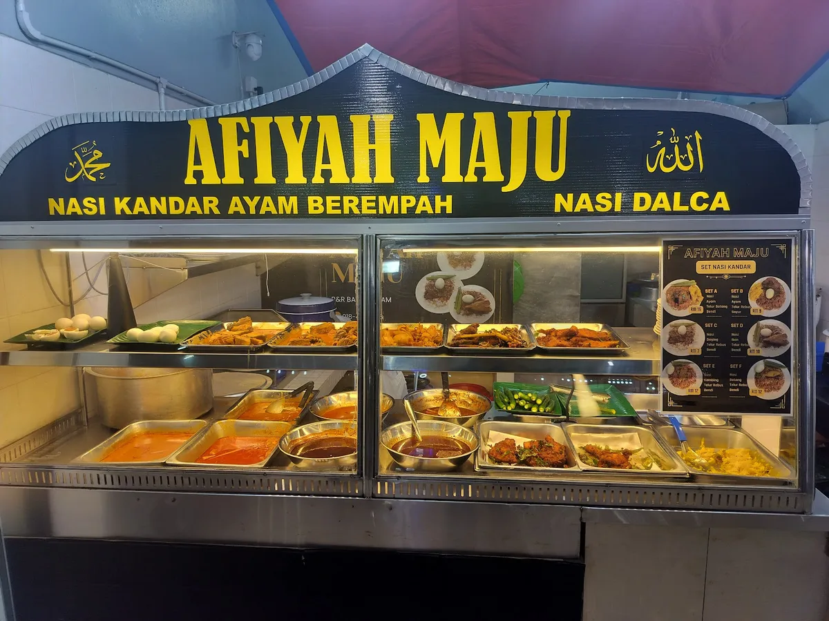 Counter signboard: nasi kandar ayam berempah, nasi dalca