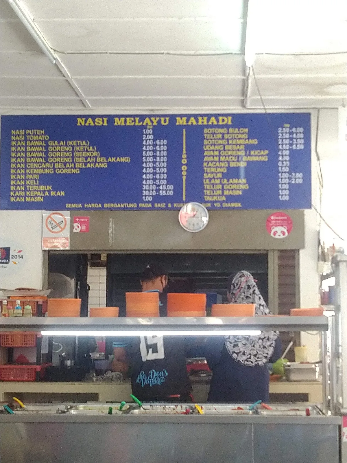 Nasi Melayu Mahadi stall and menu board