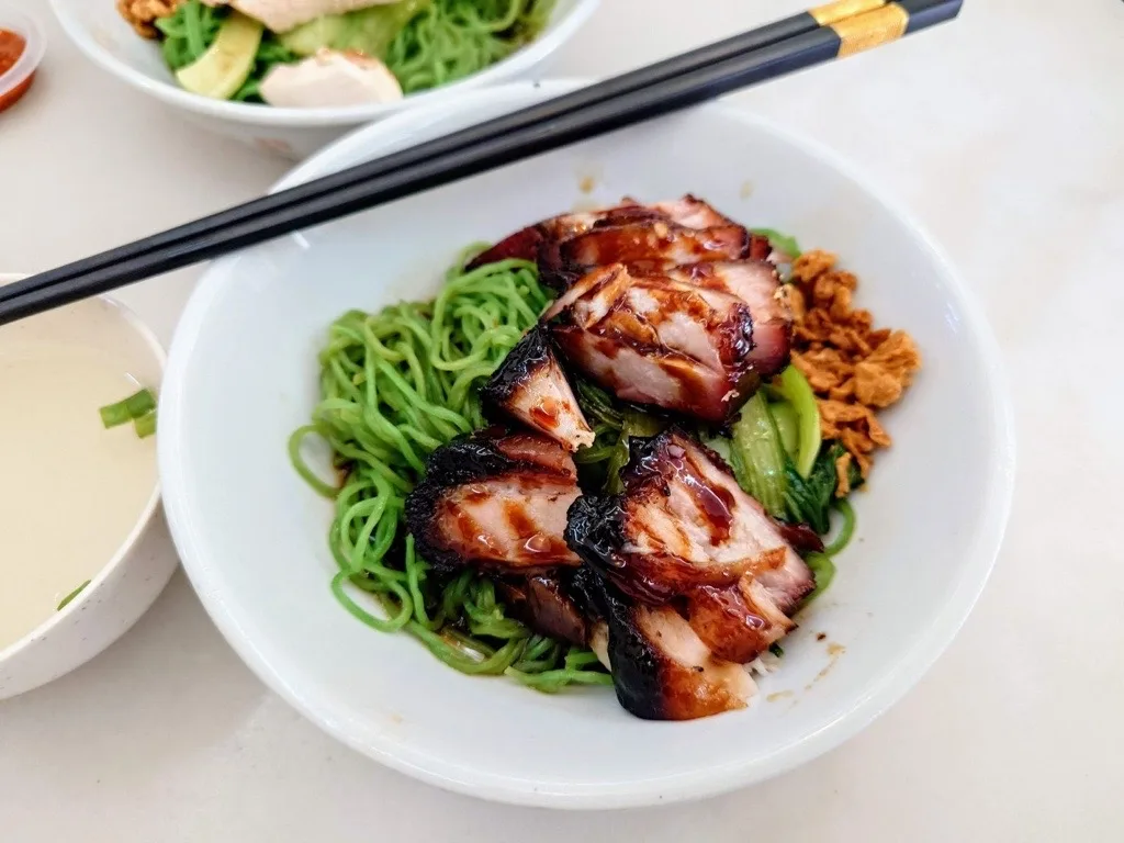 Char siew on spinach noodles