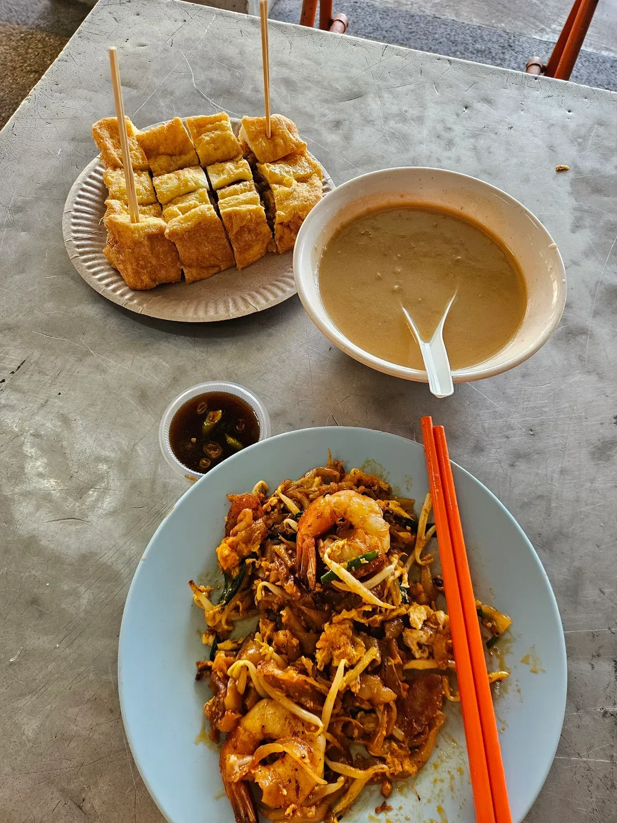 Char Kuey Teow • Padang Brown Food Court — signature dish
