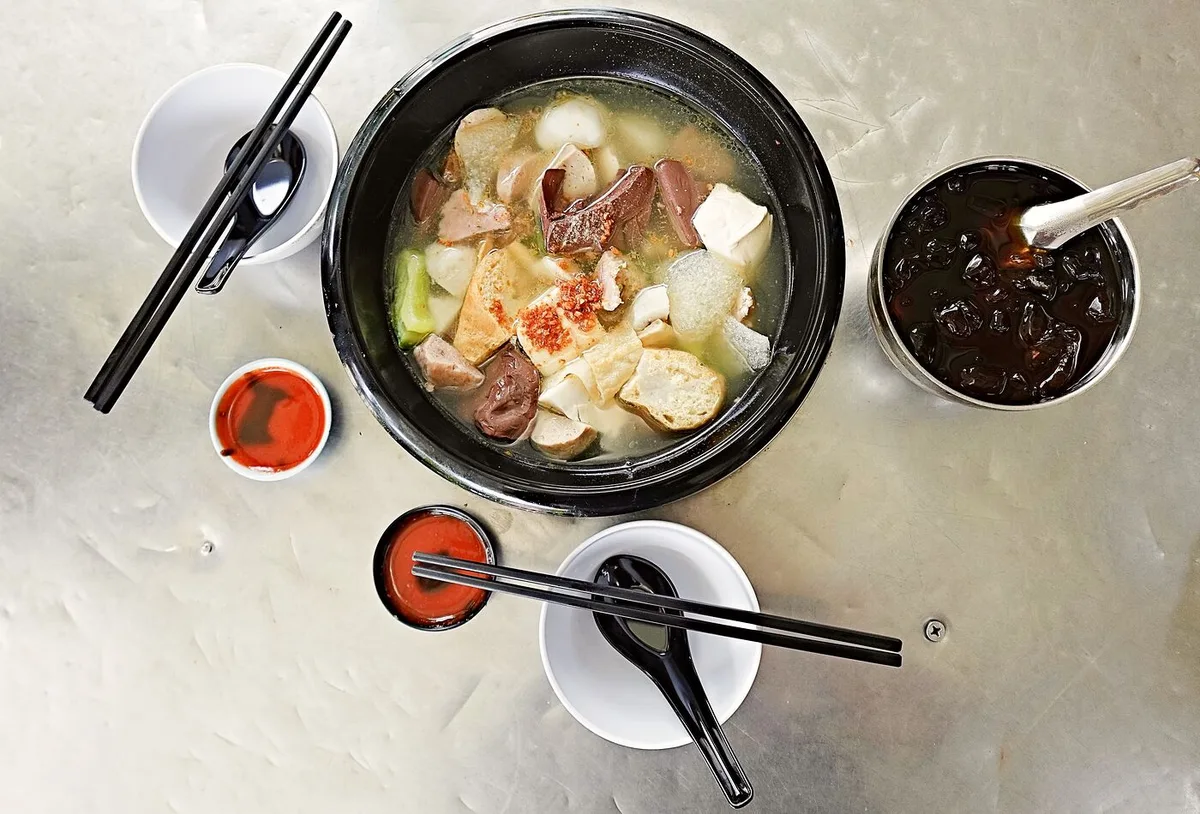 Hakka yong tau foo in clear broth with stuffed tofu, pig blood and bitter gourd