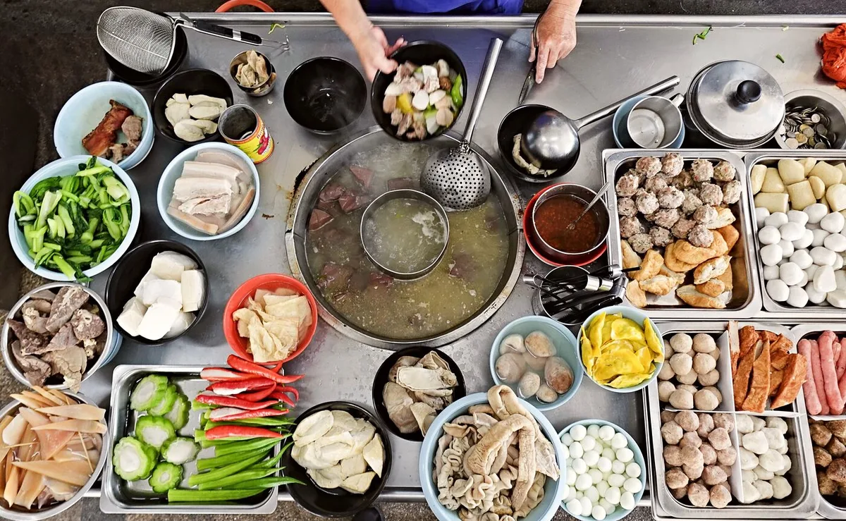 Overhead view of the yong tau foo stall's spread of stuffed items and vegetables