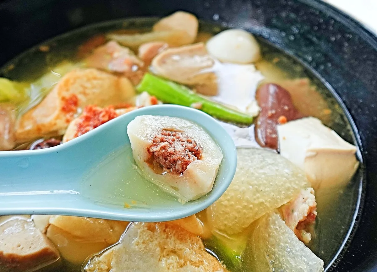 Spoonful of stuffed yong tau foo with minced pork filling