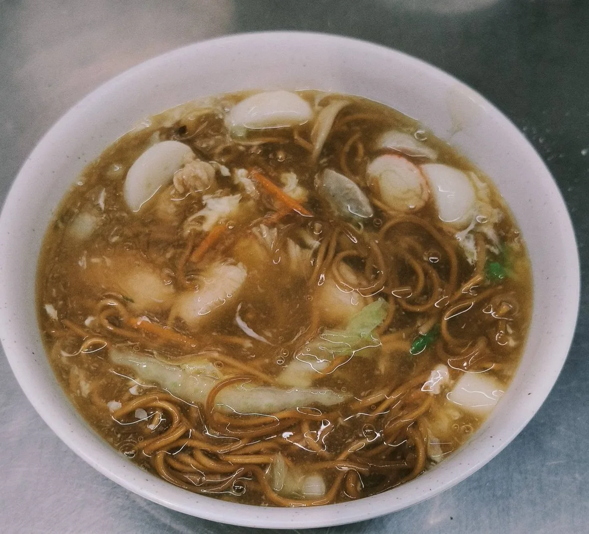 Lor noodles in egg gravy with fishcake