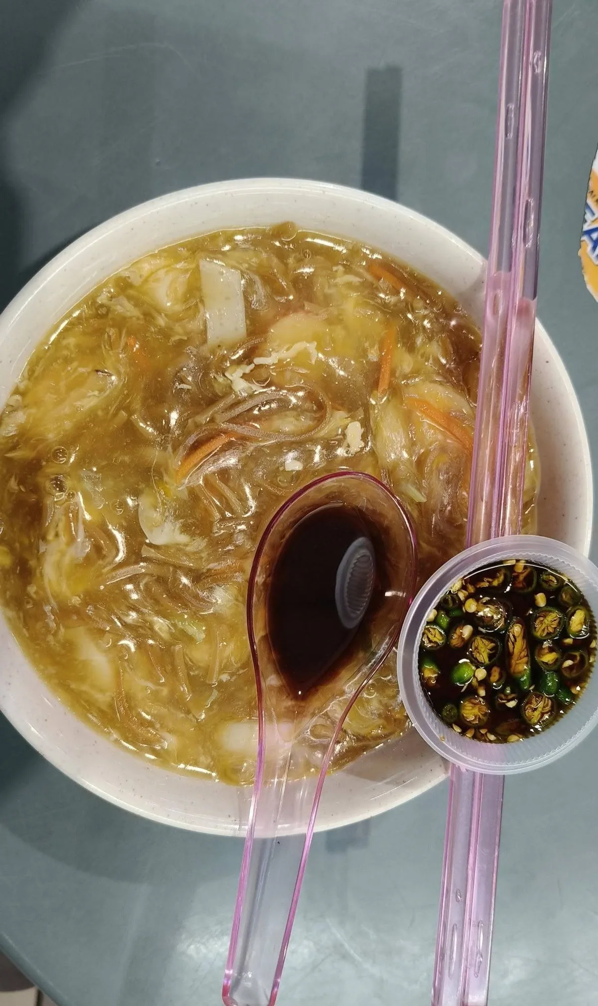 Lor char bee hoon served with cut chili padi in soy