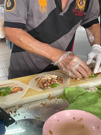 Poh Pia with Crab Meat — people
