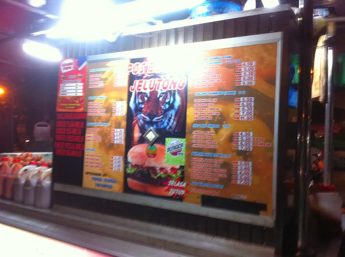 Cooking burgers at the stall