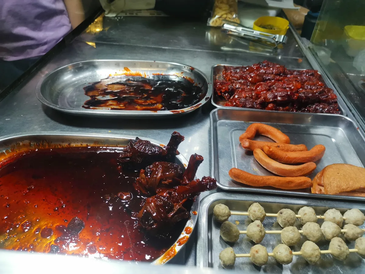 Duck legs, bak kwa and sausages at the cart