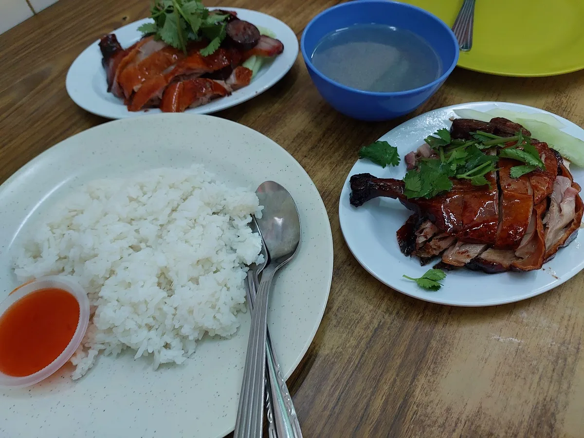 Roast duck drumstick with rice