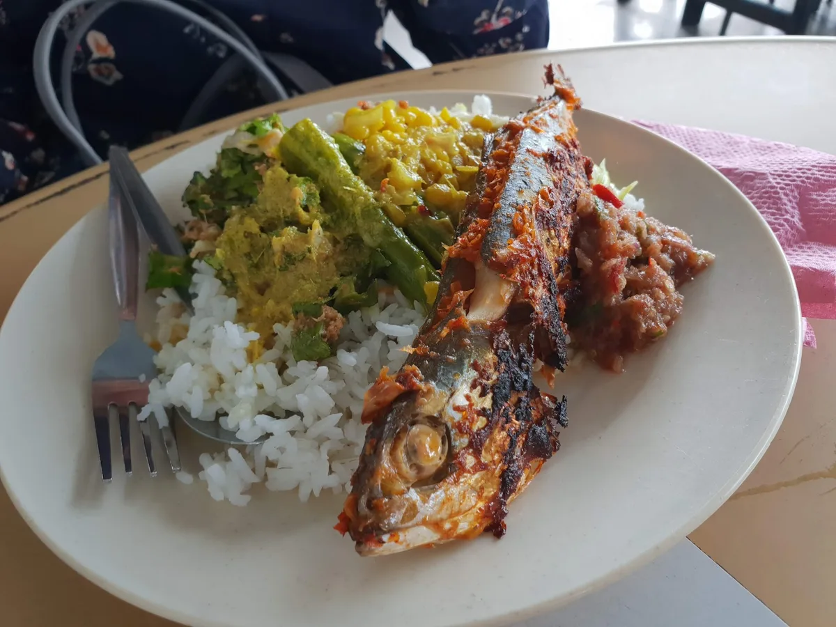 Nasi campur with grilled fish and kampung vegetables