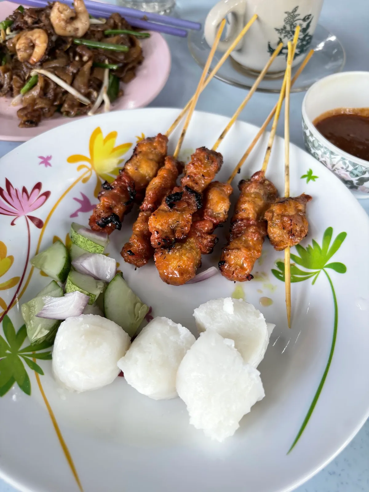 Chicken satay with nasi impit