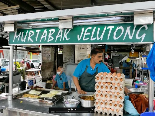 Roti Canai dan Murtabak Legend Jelutong — signage