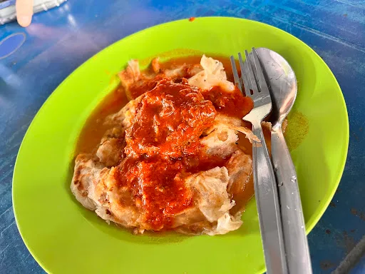 Roti Canai Mamu Kader — signature dish